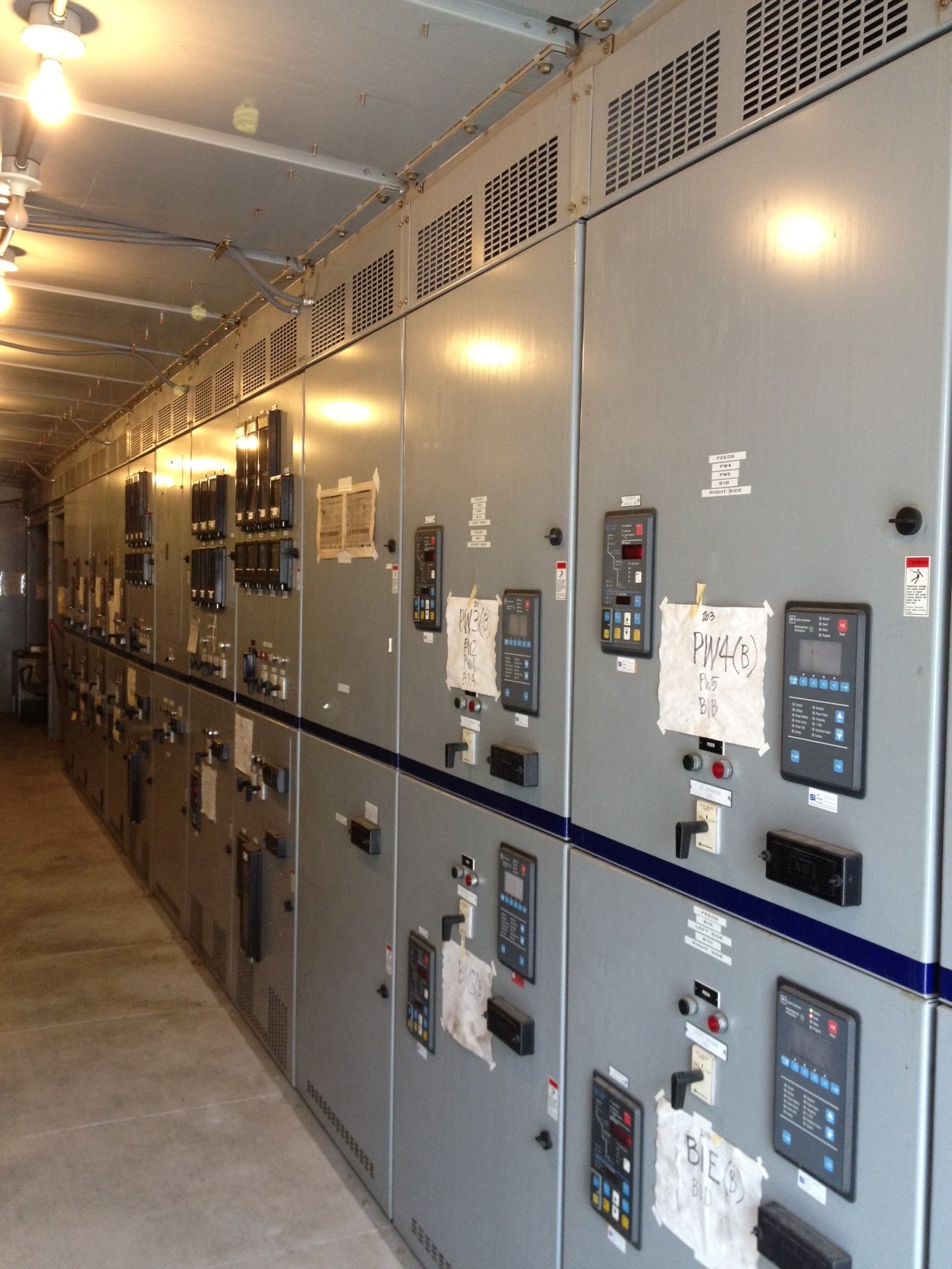 Room full of Hitachi electrical boxes.